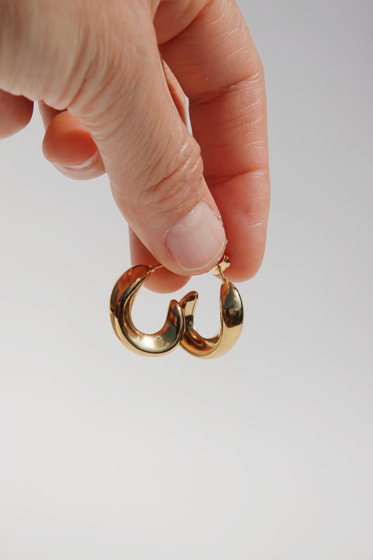 Gold Croissant Curve Studs